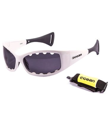 Gafas de sol deportivas Ocean Fuerteventura blancas con lentes polarizadas ahumadas para running y deportes acuáticos.