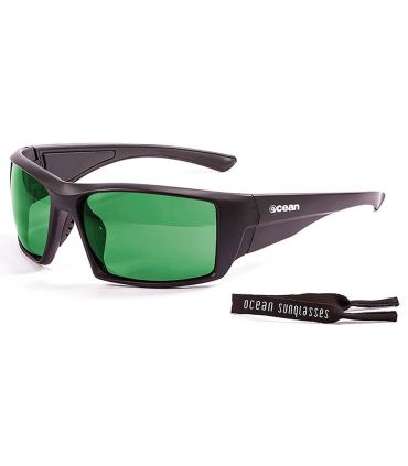 Gafas de sol deportivas Ocean Aruba Shiny Black con lentes polarizadas verdes Revo Green y patillas flotantes.