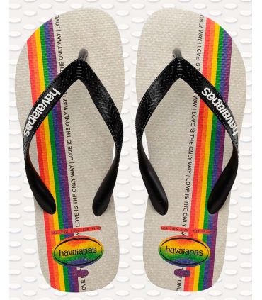 Chanclas Havaianas Top Pride con mensaje Love is the only way impreso en la suela y diseño colorido.