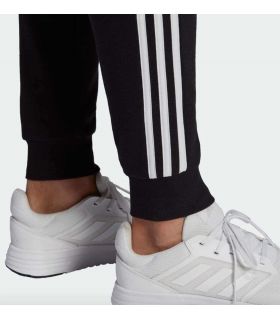 Pantalones técnicos running - Adidas Pantalones Essentials Fleece Fitted 3-Stripes negro Textil Running