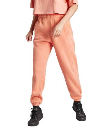 Pantalón Adidas All Szn rosa para mujer, corte holgado de algodón con cintura y puños elásticos.