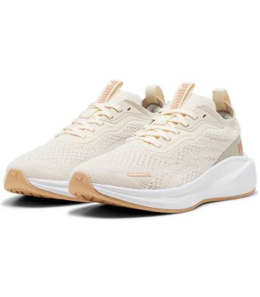 Zapatillas de running Puma Skyrocket Lite para mujer en color beige con amortiguación ProFoam y suela de goma.