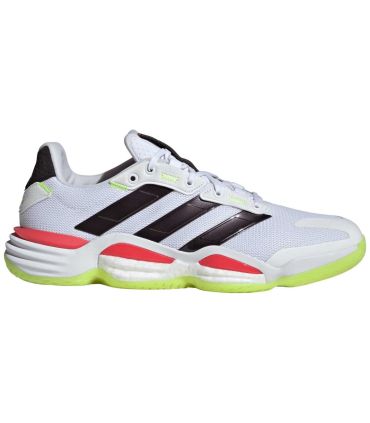Zapatillas Adidas Stabil 16 Indoor blancas con tecnología BOOST para estabilidad y potencia en pistas cubiertas.