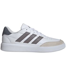 Zapatillas blancas Adidas Courtblock 09 para hombre, estilo casual minimalista con suela de goma resistente.