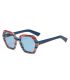 Gafas de sol polarizadas Ocean Santa Giulia con montura floral azul y lentes azules.