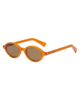 Gafas de sol polarizadas Ocean Espiguette con montura marrón transparente y lentes marrones.