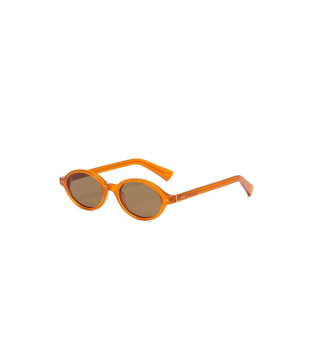 Gafas de sol polarizadas Ocean Espiguette con montura marrón transparente y lentes marrones.