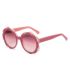 Gafas de sol polarizadas Ocean Deauville con montura rosa transparente y lentes moradas degradadas para mujer.