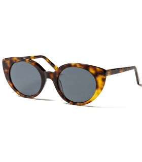 Gafas de sol polarizadas Ocean Greta con montura marrón y lentes ahumadas para running y uso diario.